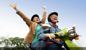 old couple on scooter